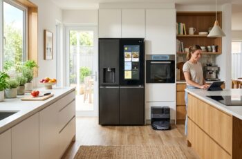 Modern kitchen with smart connected appliances and robot vacuum charging station